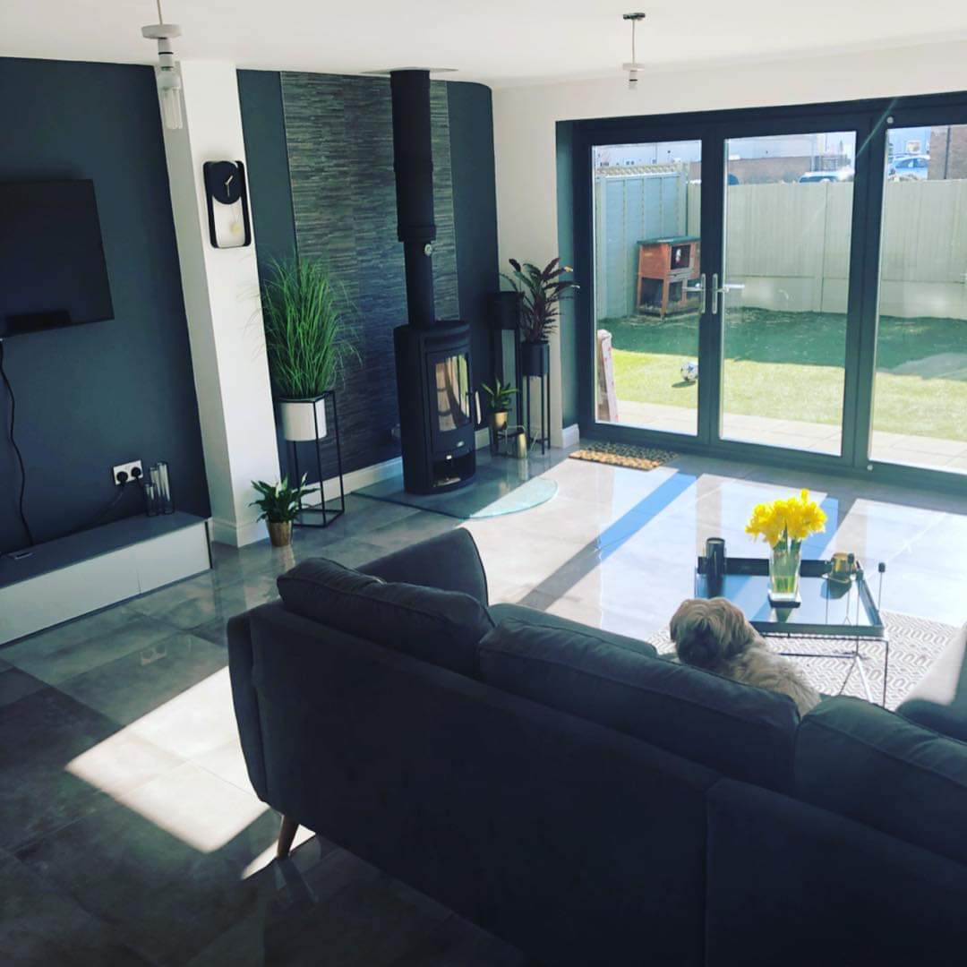 Modern living room renovation completed in Deal home